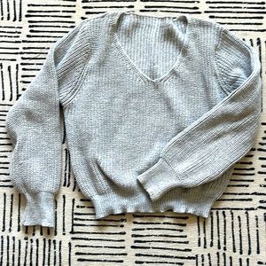 Size small, but slightly slouchy cute lightweight grey v neck sweater!